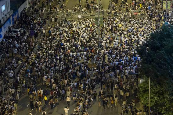 Hong Kong police use tear gas to break up democracy protesters